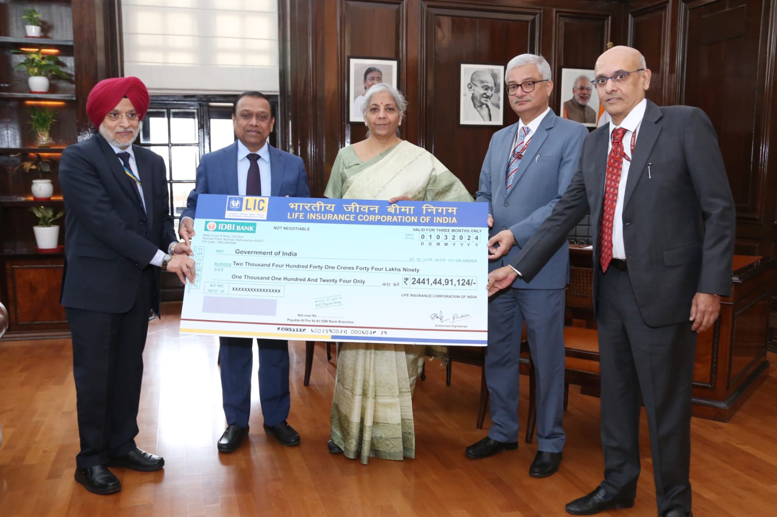 Lic Presented Rs Rs Dividend Cheque To Smt Nirmala